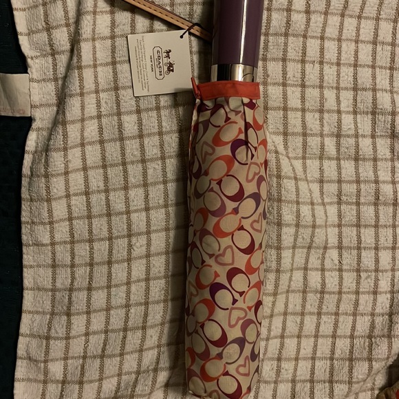 Brand new with tags Coach umbrella. Never used. - Picture 2 of 5